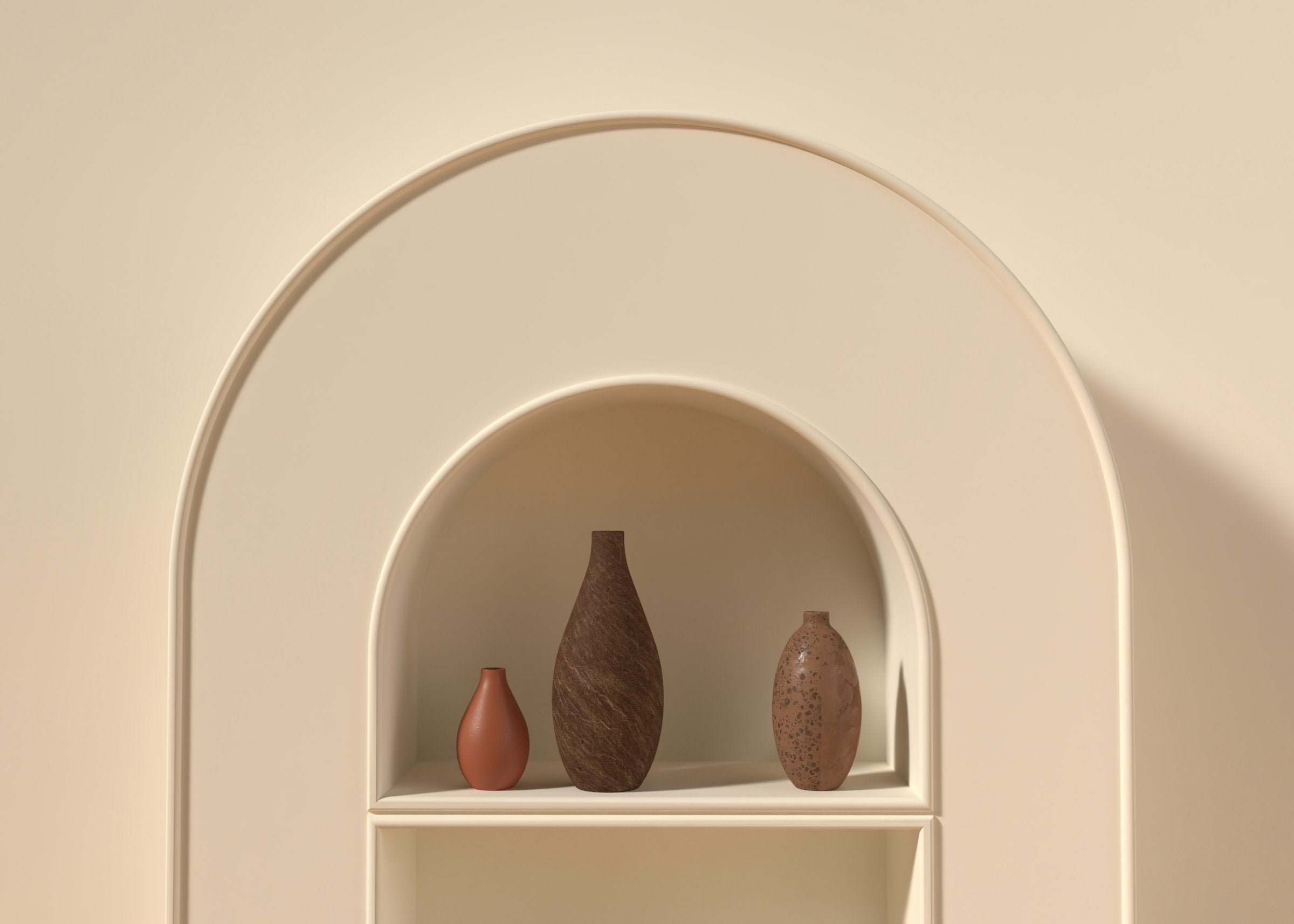 Arched cream shelf styled with three earthy vases